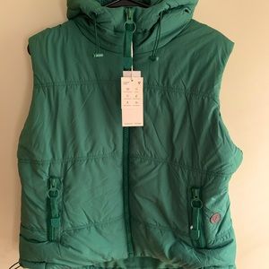 NEW Green hooded puffer vest. Zip front/pockets. Pull strings on waist/hood.